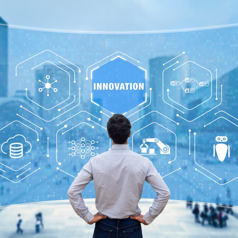 Innovation concept with researcher working on emerging technologies to develop innovative products. Digital disruption with IoT, robotic process automation, big data and artificial intelligence Innovation concept with researcher working on emerging technologies to develop innovative products. Digital disruption with IoT, robotic process automation, big data and artificial intelligence